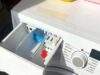 Waar het derde vakje van je wasmachine echt voor is: zo gebruik je het optimaal